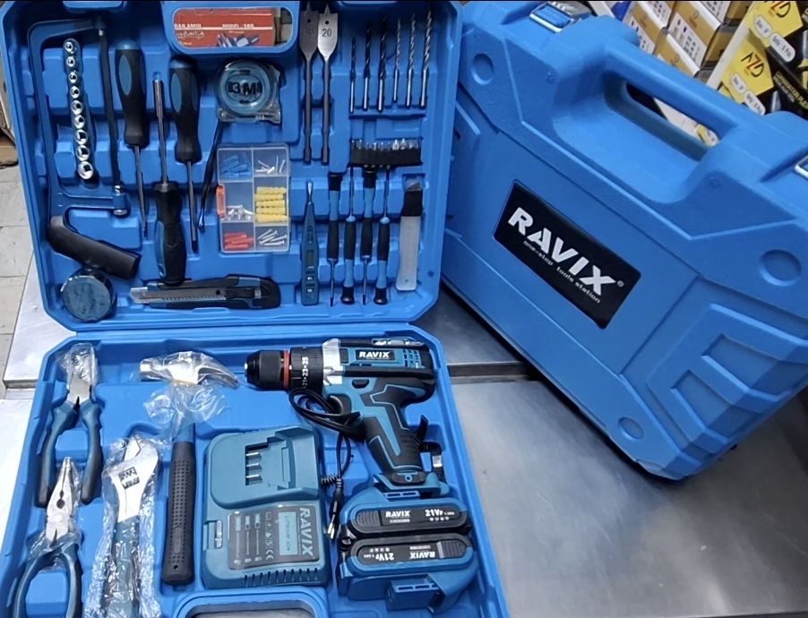 کیت دریل شارژی 21 ولت دو باطری با لوازم برند راویکس مدل RX-2160